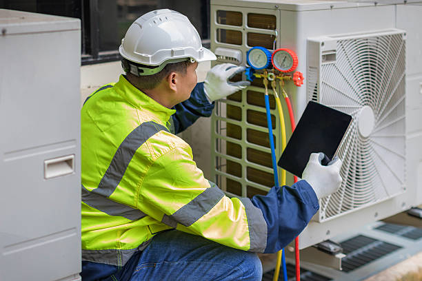 Professional Air Duct Cleaning technician working in Seymour, MO